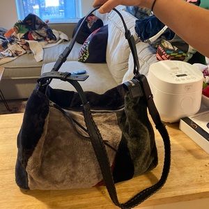 Like New All Saints real shearling shoulder/weekender bag -2 straps. NEVER USED